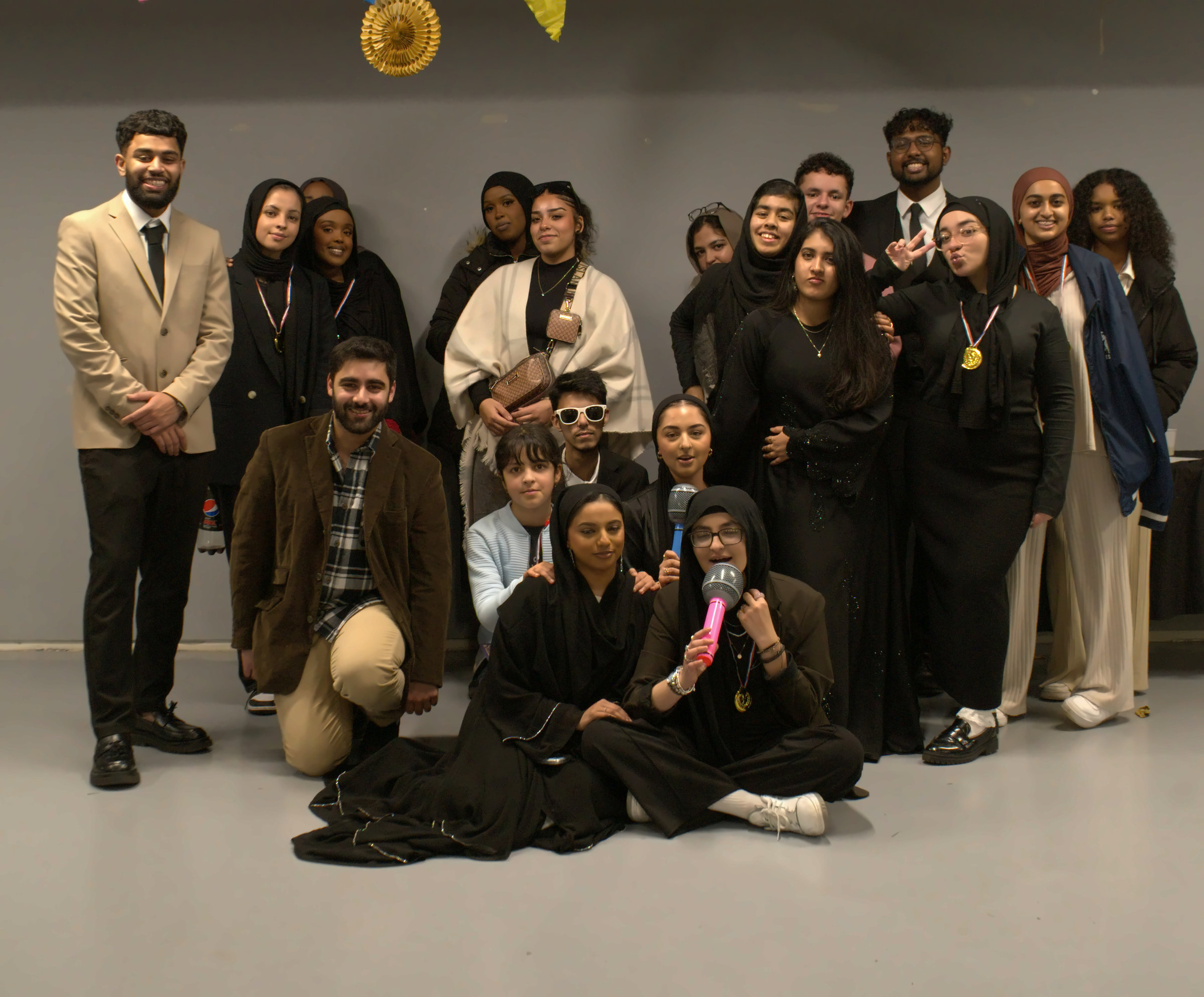 Attendees gathered for a group photograph at a community awards evening.